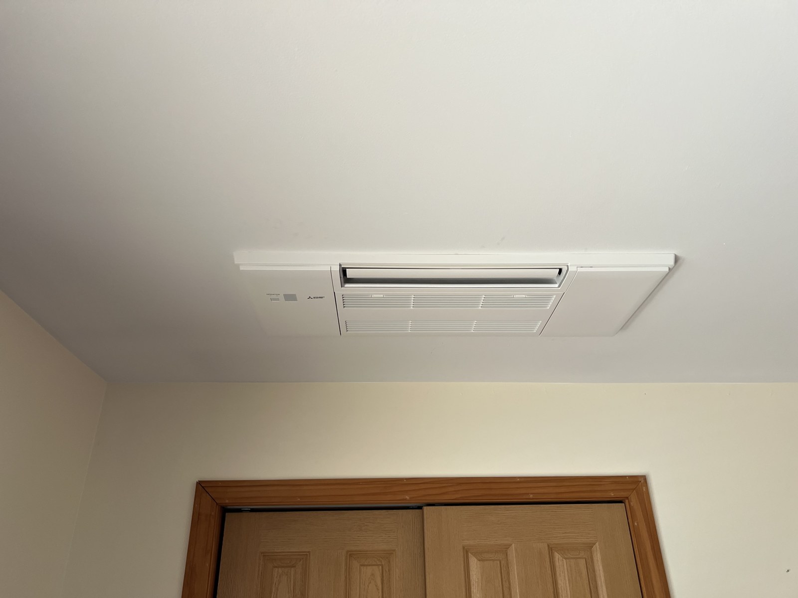 Ceiling-recessed Mitsubishi indoor unit installed in a Meredith NH home
